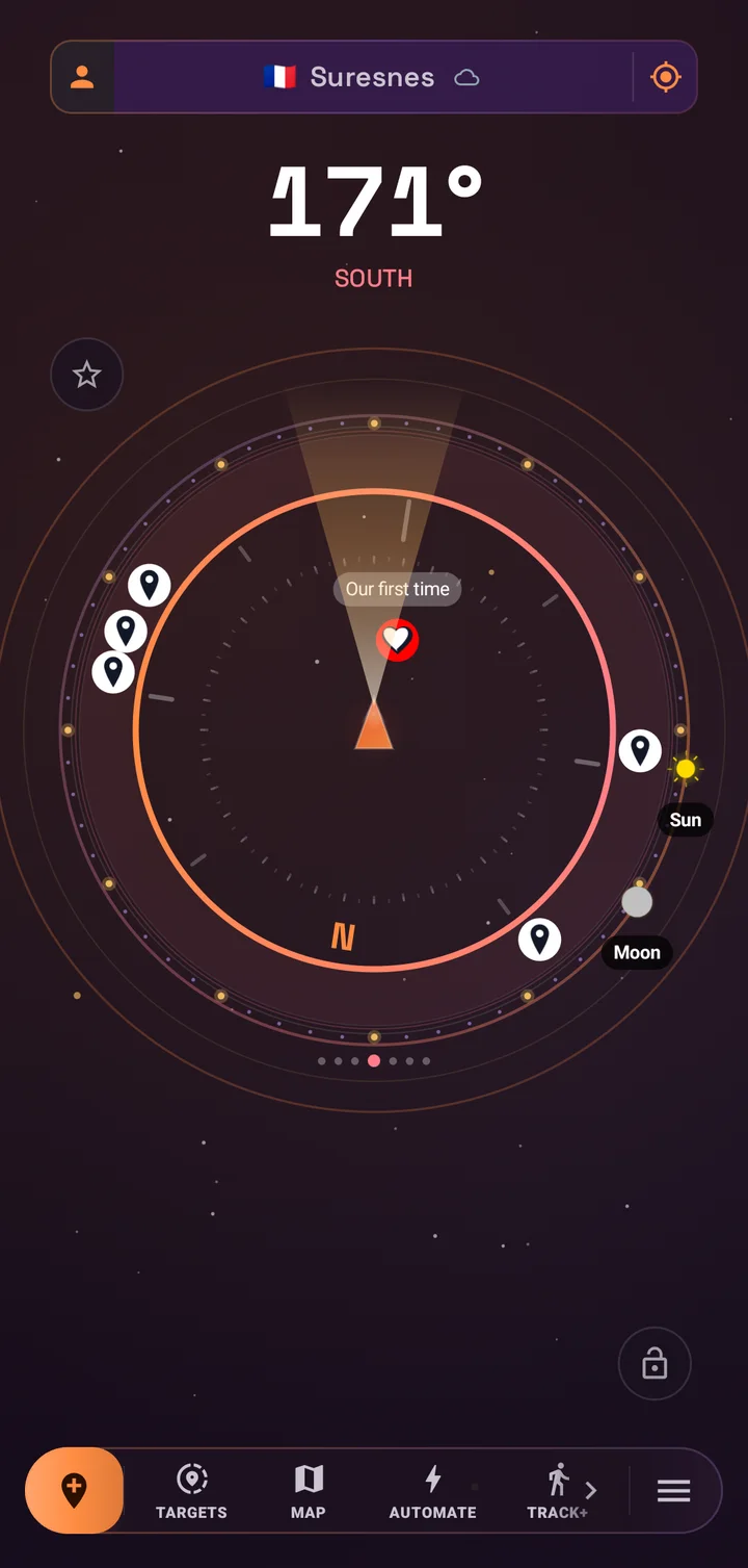SIMT compass home screen in the Cosmos theme, with a warm ember dial, starfield background, and Sun and Moon badges on the outer ring