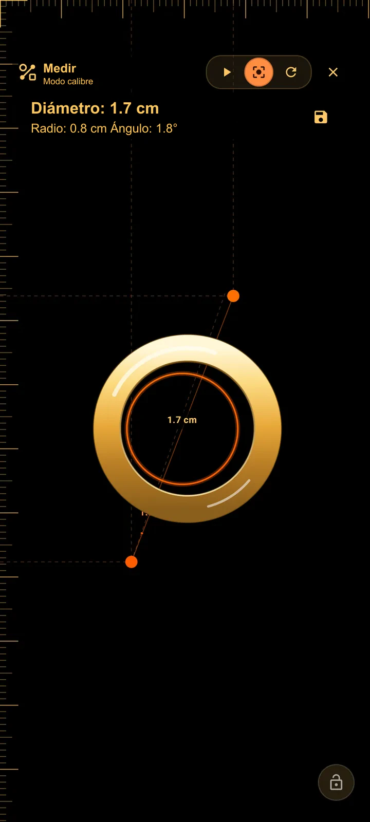 SIMT Measure en modo Caliper con un anillo sobre la pantalla del teléfono y la línea del calibre cruzando su diámetro interior, con lecturas de diámetro y radio